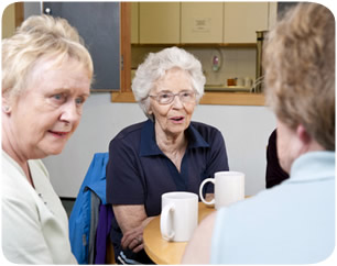 Group of ladies drinking coffee at a day care centre