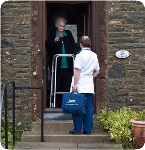 A member of the rapid reponse team undertaking a home visit